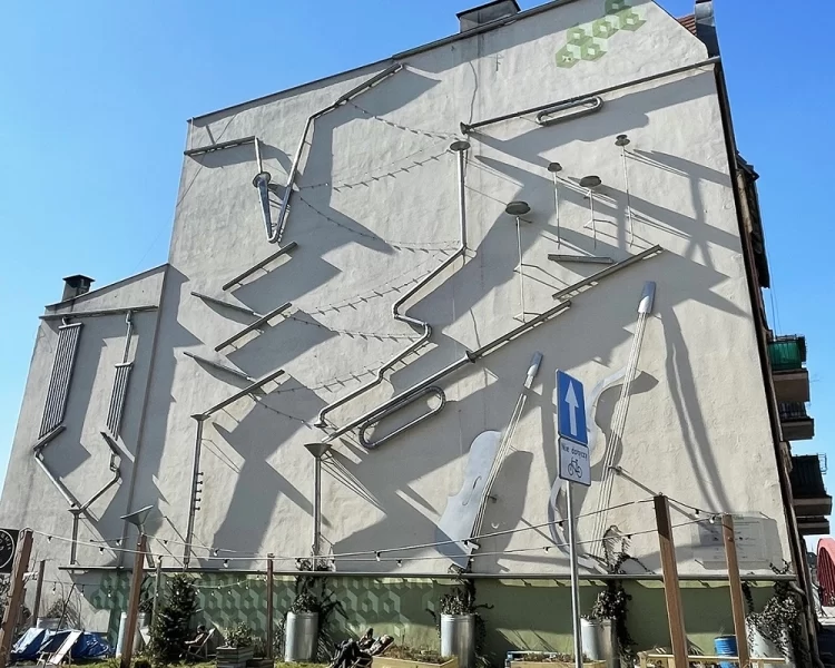 Тривимірна фреска 'Оповідь Зрудки' на стіні будинку в Познані
